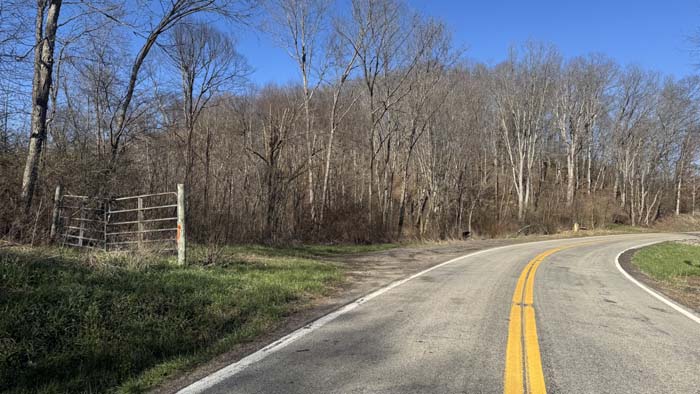Aerial showing mix of pasture and wooded ground