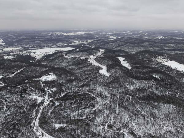 Natural terrain diversity across 166 acres in Noble County Ohio