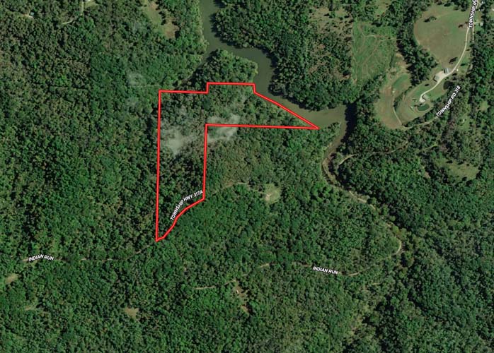 Gravel road leads to timber entry