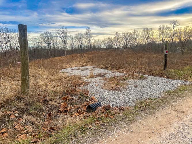 Gallia County Ohio hunting property with fence posts along road