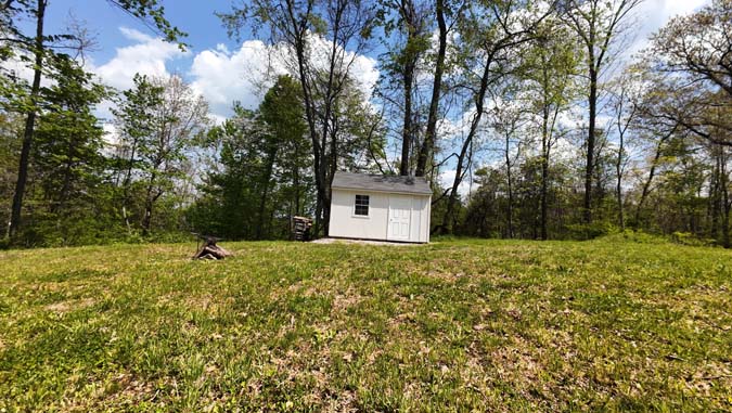 31-acre Noble County Ohio hunting camp with insulated outbuilding