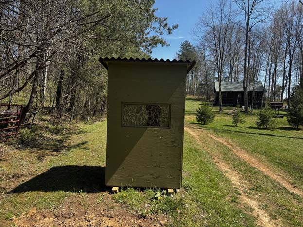 Covered porch overlooking field