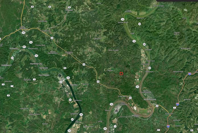 Wide aerial of rolling hills and timber