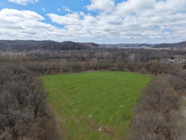 Little Scioto River bordering wooded acreage