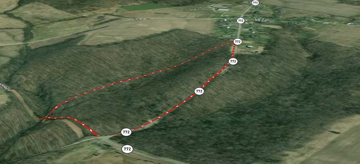 cleared stretch with direct entry to wooded acres