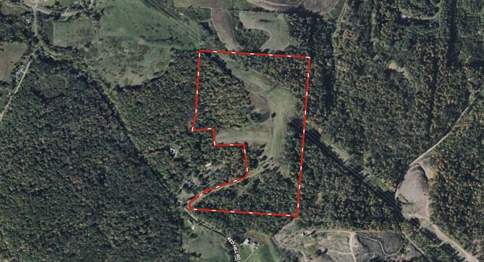 Wide open pasture land with distant ridge views in Southern Ohio Meigs County