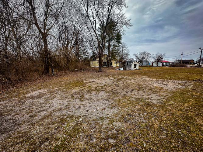 Vacant land near restaurant and retail area