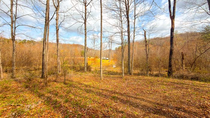 Recreational property with rolling hills and wooded areas