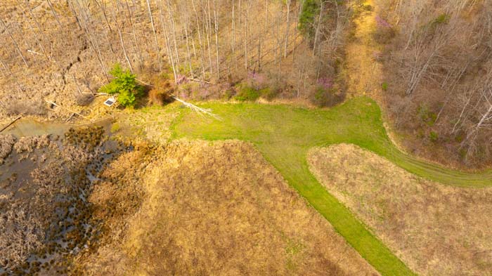 Outdoor acreage with mixed terrain and natural surroundings