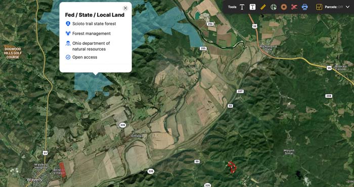 Wooded property with natural terrain and scenic surroundings