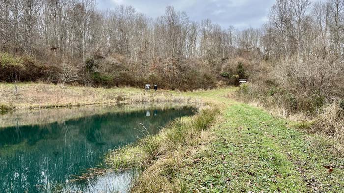 John Deere mower included with property