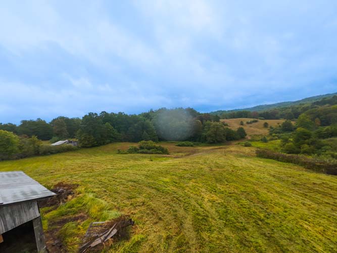 Wide open field for recreation, livestock, or building