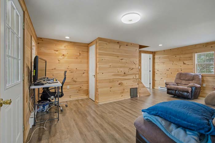 View of cabin and surrounding timber from driveway entrance at Rife Road property
