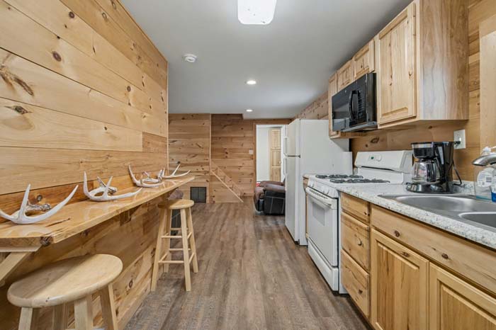 Wooded hillside providing diverse terrain for wildlife at 37254 Rife Road