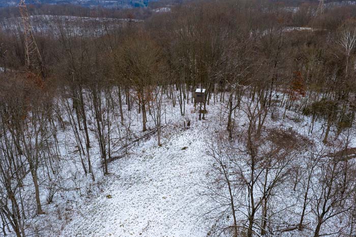Food plot and feeder setup with deer sign on Rife Road hunting property