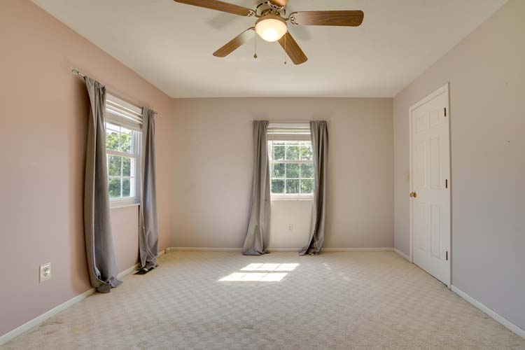 Second bedroom with closet and carpet flooring