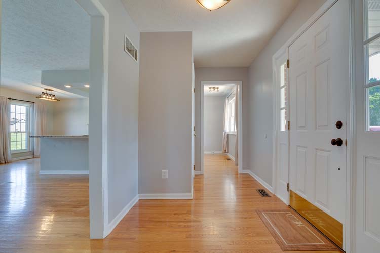 Lower level half bath and laundry area