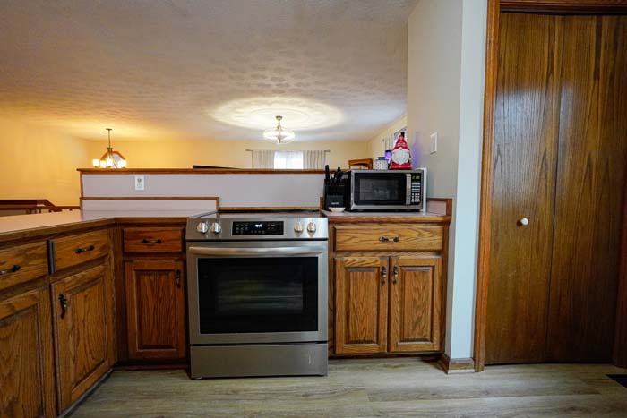 Oak staircase entry inside 588 Ward Road showcasing quality craftsmanship
