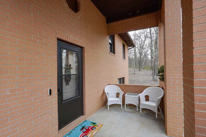 Wide view of rural acreage and treeline at 588 Ward Road Bidwell Ohio