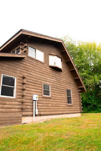 Screened porch and backyard deck at Ohio cabin