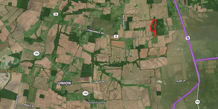 Wooded setting and pond at Panhandle Road property