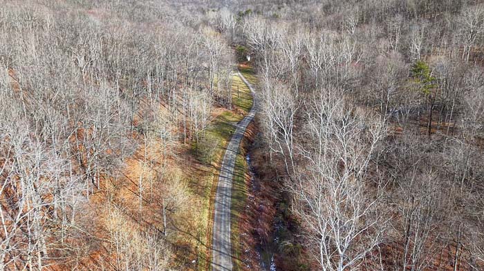 Established trail system for easy access across 14.5 acre hunting property in Pike County Ohio