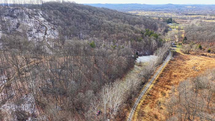 Creek frontage creating natural boundary on Pike County Ohio recreational land for sale
