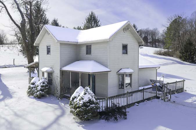 Front exterior view of move in ready home on Clark Road in Washington County Ohio