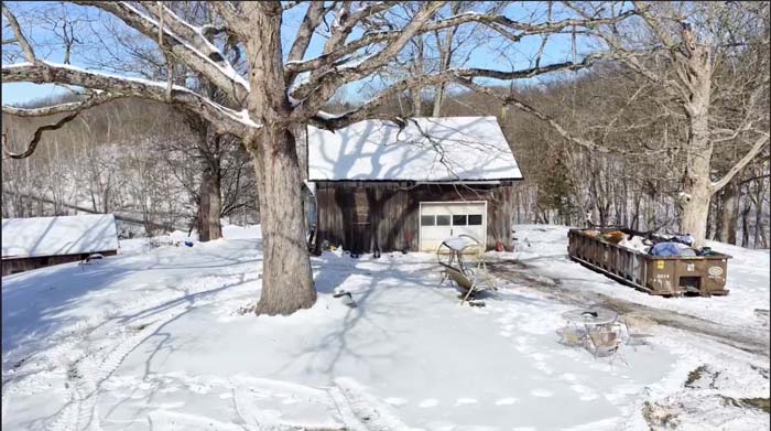 Aerial perspective of Clark Road tract with road frontage and utilities