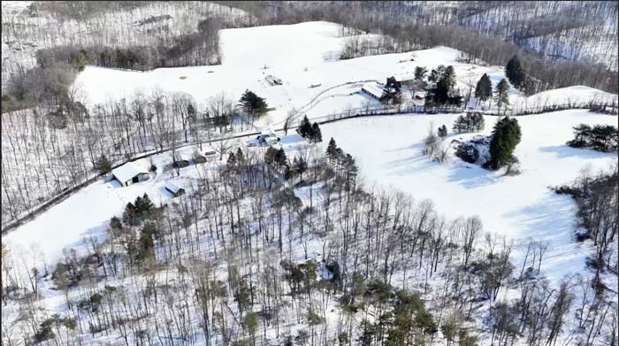 Scenic view of open land and hardwoods on Washington County Ohio property