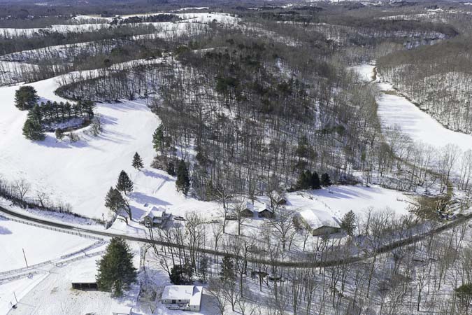 Detached garage with electric and concrete floor on rural Ohio property