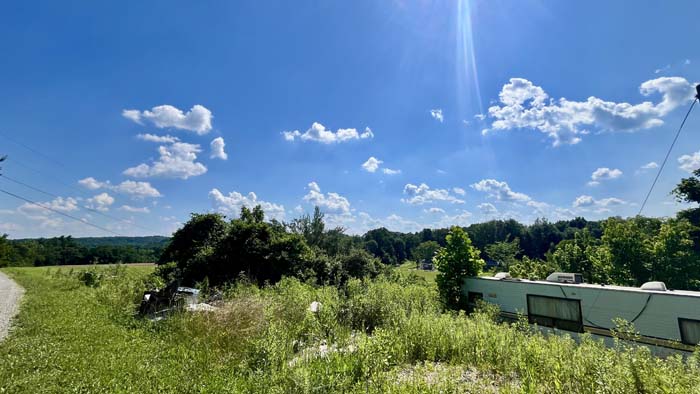 Gravel township road leading to private wooded lot in Muskingum County.