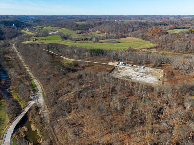 hunting trail through timbered hillside