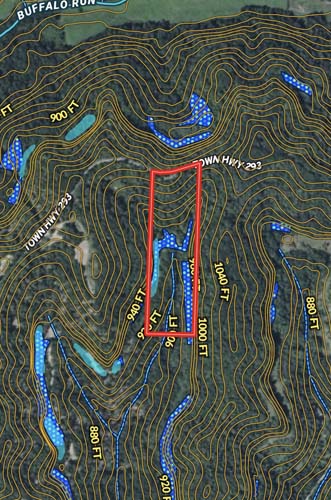 driveway area leading to wooded lot