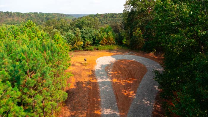Jackson County timberland with gravel driveway entrance
