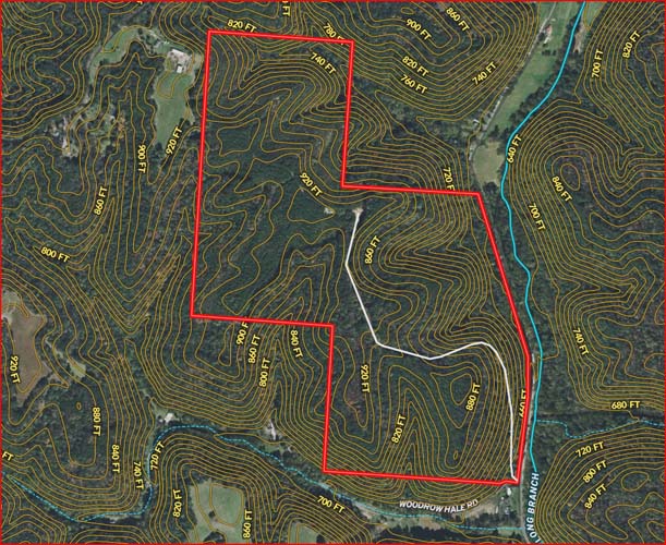 Wide gravel driveway with new stone base