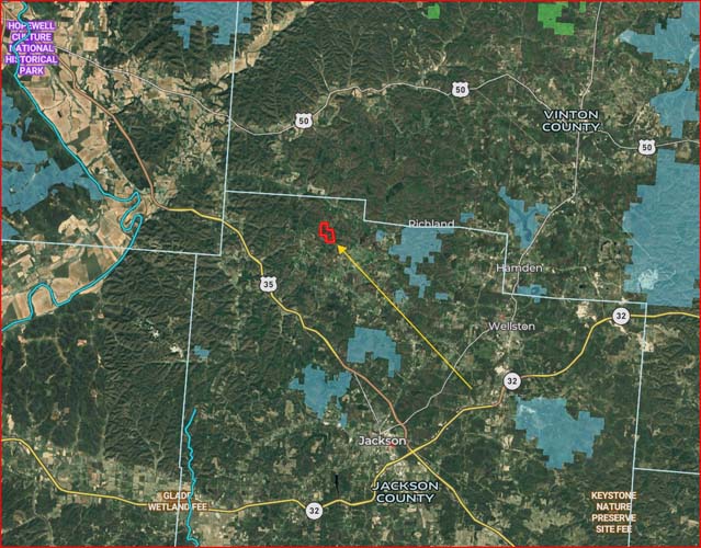 Driveway leading into deep interior of property